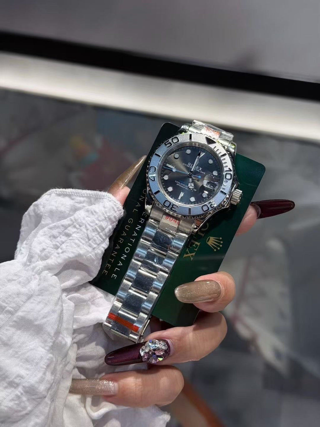 Rolex Blue Dial Silver Bracelet Watch — front